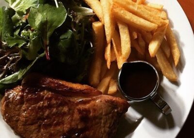 Plate of steak chips and salad